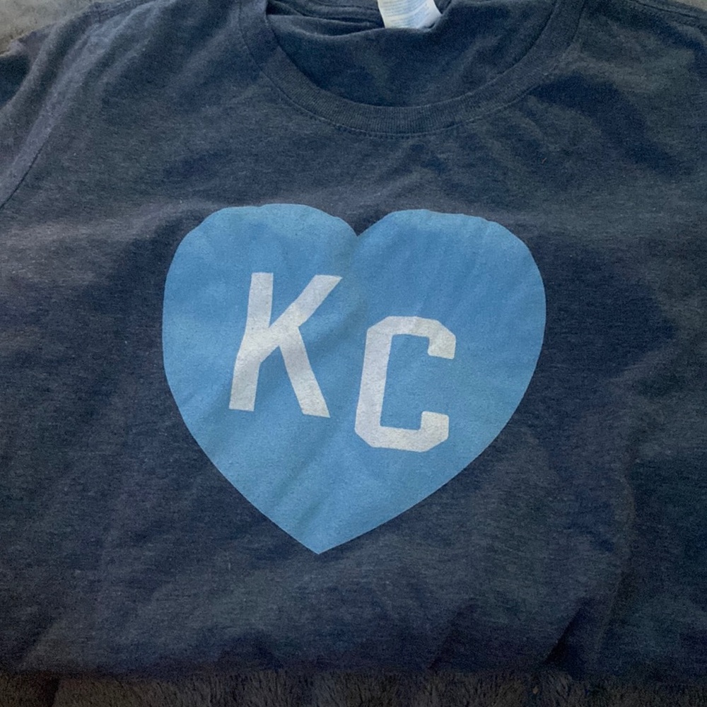 Grey and light blue, (KC) kansas city top, only worn like once! in good shape.